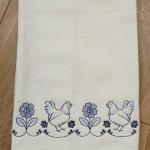 I just love this chicken/flower border.  Thread colors can be changed.  Add a name or initials to personalize it.