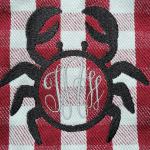 This crab design was embroidered on a tote bag that was checked.  So on a normal blank design, it will show up more clearly.
Her Et