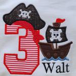 Add $3.00 to this cost of this applique, due to the fact that it has 3 appliques.  Applique number, applique pirate hat and applique ship.  Also includes a name.  PA