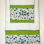 An adorable set of towels for Baby Hilton's bathroom.  We used fabrics which were in the nursery to tie everything in together.  